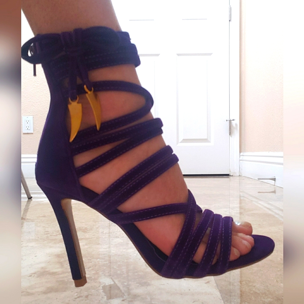 Purple high heels booties.